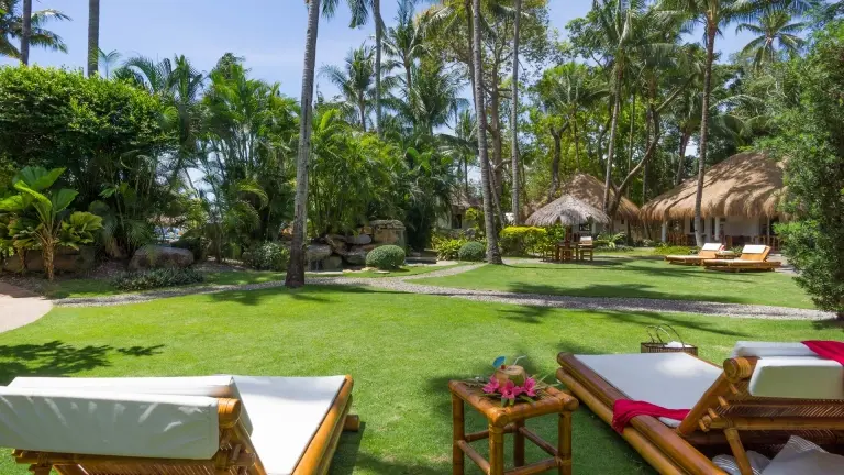 Sun loungers at Pura Vida Resort in Dauin, the Philippines