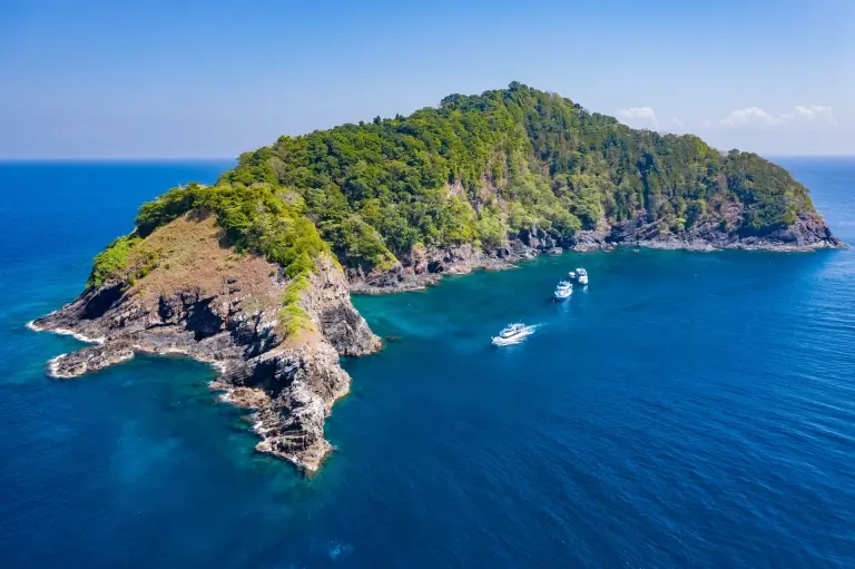 Dive boat over the Koh Bon dive site in the Similan Islands, Thailand