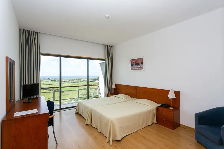 Twin bedroom at the apartments at Hotel Colombo in Santa Maria, the Azores