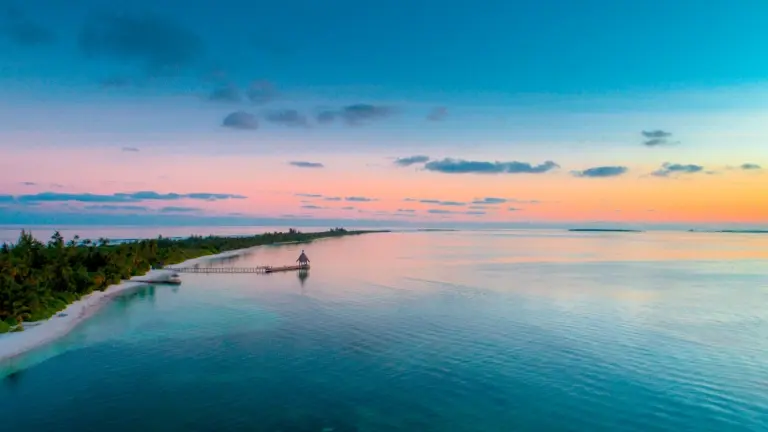 Aerial of Canareef Resort in the Maldives at sunset