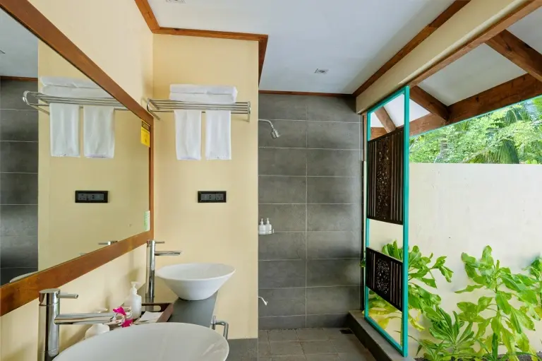 Sunset & sunrise villa bathroom at Canareef Resort in the Maldives