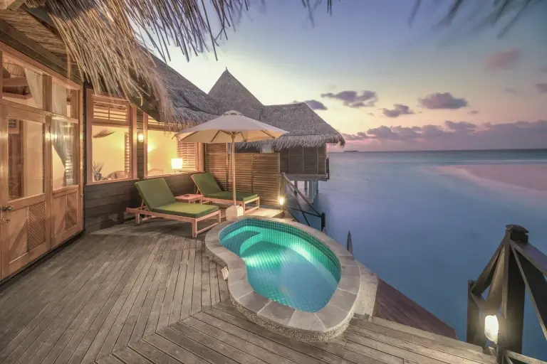 Sunset from a sunset lagoon villa, at Coco Palm Dhuni Kolhu Resort, Maldives