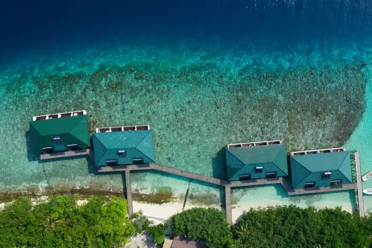 Aerial of the overwater villas at Embudu Village accommodation in the Maldives