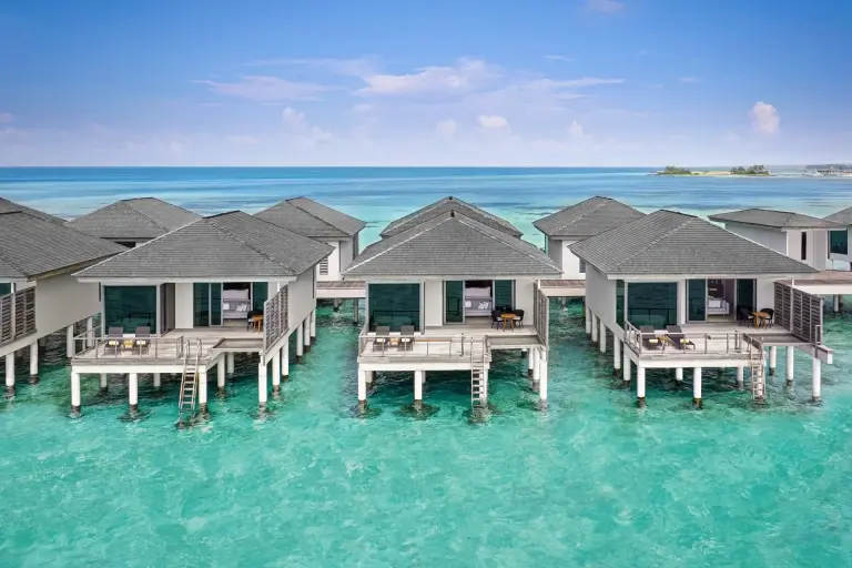 Aerial view of the over-water villas at Le Meridien Maldives Resort & Spa, Maldives.