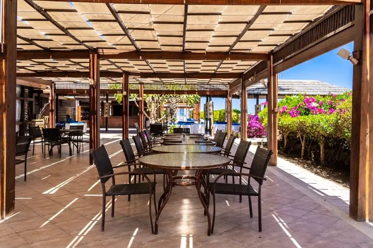 Outdoor dining area at Abu Dabbab Diving Lodge in Egypt
