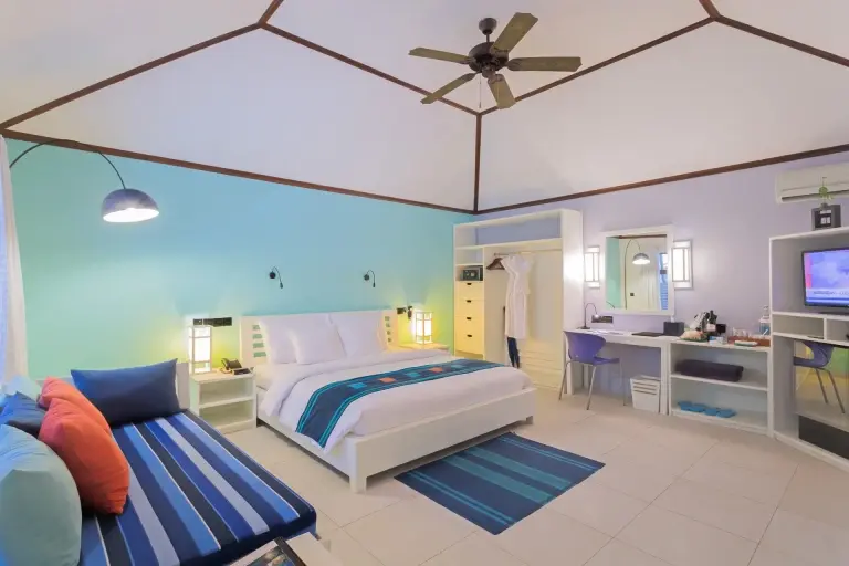 Bedroom at Meeru Island Resort, Maldives