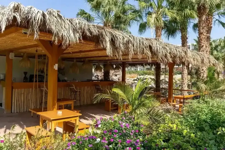 Tables under a canopy at Fort Arabesque Resort, Egypt